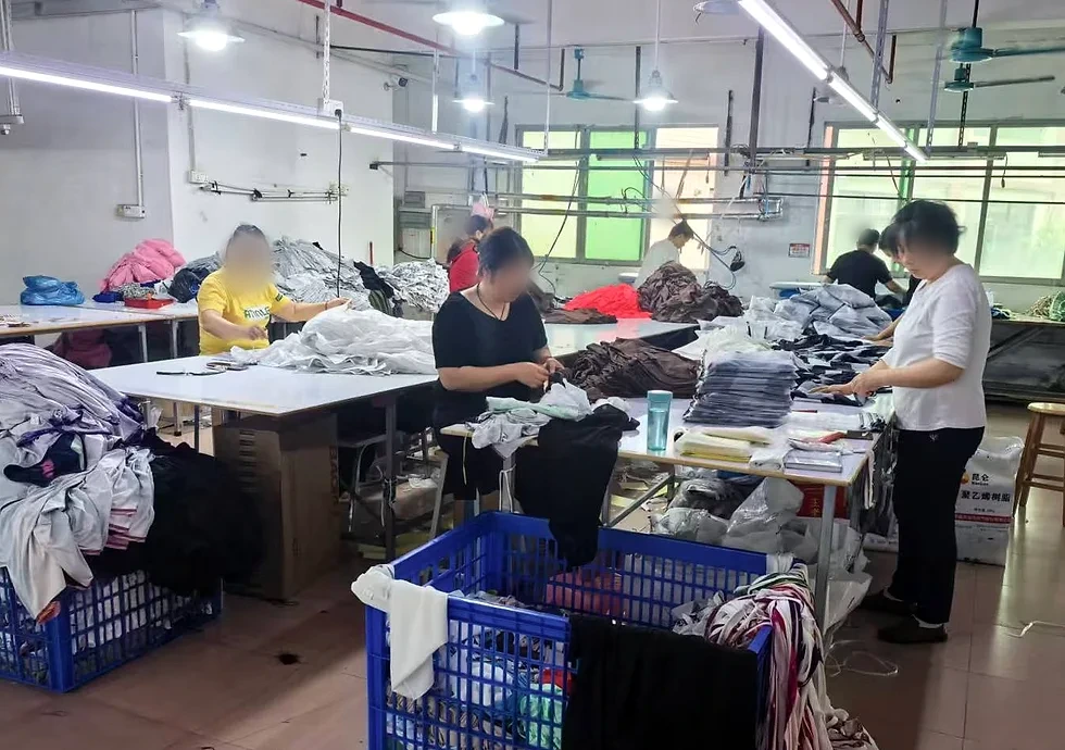 Workers checking, sorting and packing apparel orders